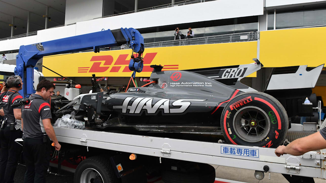 The crashed car of Romain Grosjean (FRA) Haas VF-17 is recovered in Q1 at Formula One World Championship, Rd16, Japanese Grand Prix, Qualifying, Suzuka, Japan, Saturday 7 October 2017. © Mark Sutton/Sutton Images