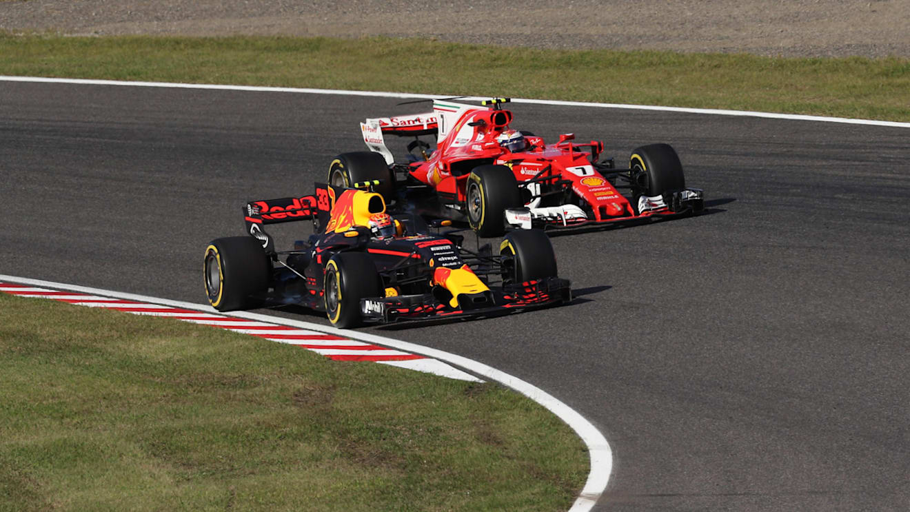 Max Verstappen (NED) Red Bull Racing RB13 and Kimi Raikkonen (FIN) Ferrari SF70-H battle for position at Formula One World Championship, Rd16, Japanese Grand Prix, Race, Suzuka, Japan, Sunday 8 October 2017. © Manuel Goria/Sutton Images