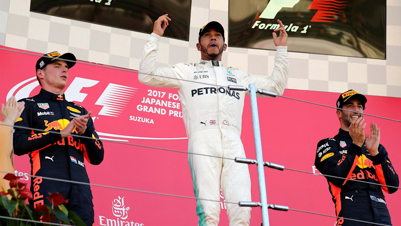 Race winner Lewis Hamilton (GBR) Mercedes AMG F1 celebrates on the podium with Max Verstappen (NED) Red Bull Racing and Daniel Ricciardo (AUS) Red Bull Racing at Formula One World Championship, Rd16, Japanese Grand Prix, Race, Suzuka, Japan, Sunday 8 October 2017. © Kym Illman/Sutton Images