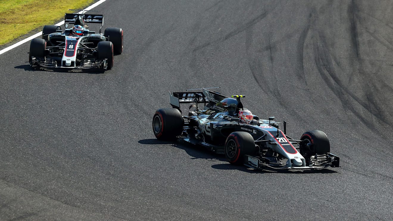 Kevin Magnussen (DEN) Haas VF-17 and Romain Grosjean (FRA) Haas VF-17 vat Formula One World Championship, Rd16, Japanese Grand Prix, Race, Suzuka, Japan, Sunday 8 October 2017. © Kym Illman/Sutton Images