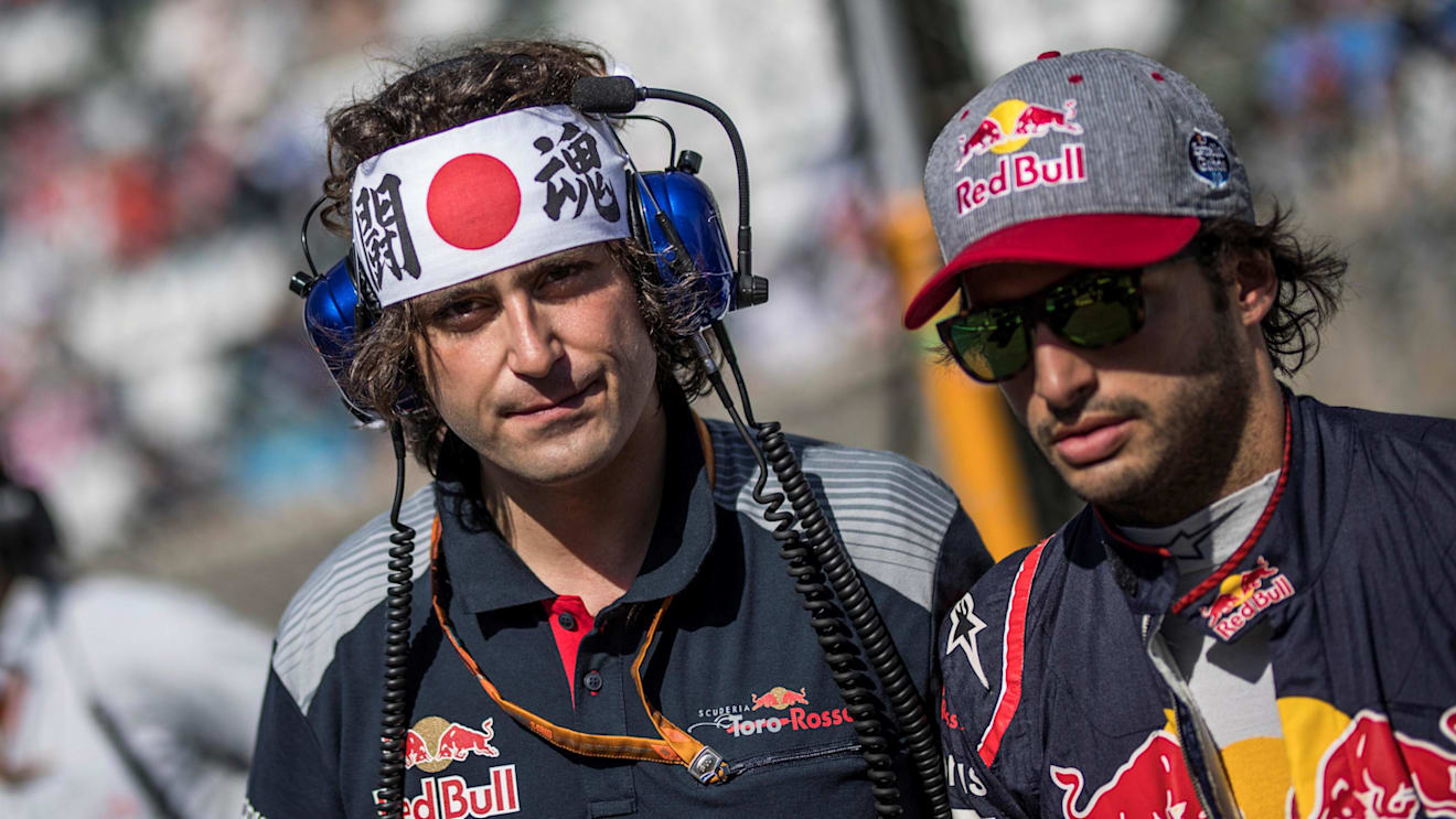 Carlos Sainz (ESP) Scuderia Toro Rosso and Marco Matassa (ITA) Scuderia Toro Rosso Engineer on the grid at Formula One World Championship, Rd16, Japanese Grand Prix, Race, Suzuka, Japan, Sunday 8 October 2017. © Manuel Goria/Sutton Images