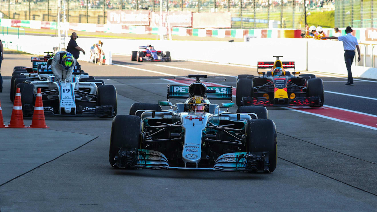 Race winner Lewis Hamilton (GBR) Mercedes-Benz F1 W08 Hybrid arrives to celebrate in parc ferme at Formula One World Championship, Rd16, Japanese Grand Prix, Race, Suzuka, Japan, Sunday 8 October 2017. © Manuel Goria/Sutton Images