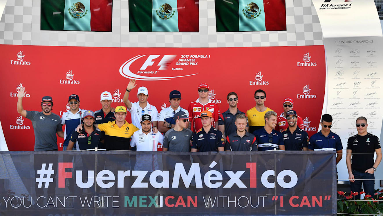 Drivers on the podium with #FuerzaMex1co sign at Formula One World Championship, Rd16, Japanese Grand Prix, Race, Suzuka, Japan, Sunday 8 October 2017. © Mark Sutton/Sutton Images