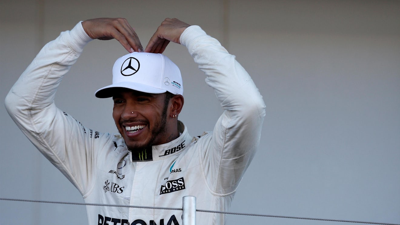 Race winner Lewis Hamilton (GBR) Mercedes AMG F1 celebrates on the podium at Formula One World Championship, Rd16, Japanese Grand Prix, Race, Suzuka, Japan, Sunday 8 October 2017. © Manuel Goria/Sutton Images