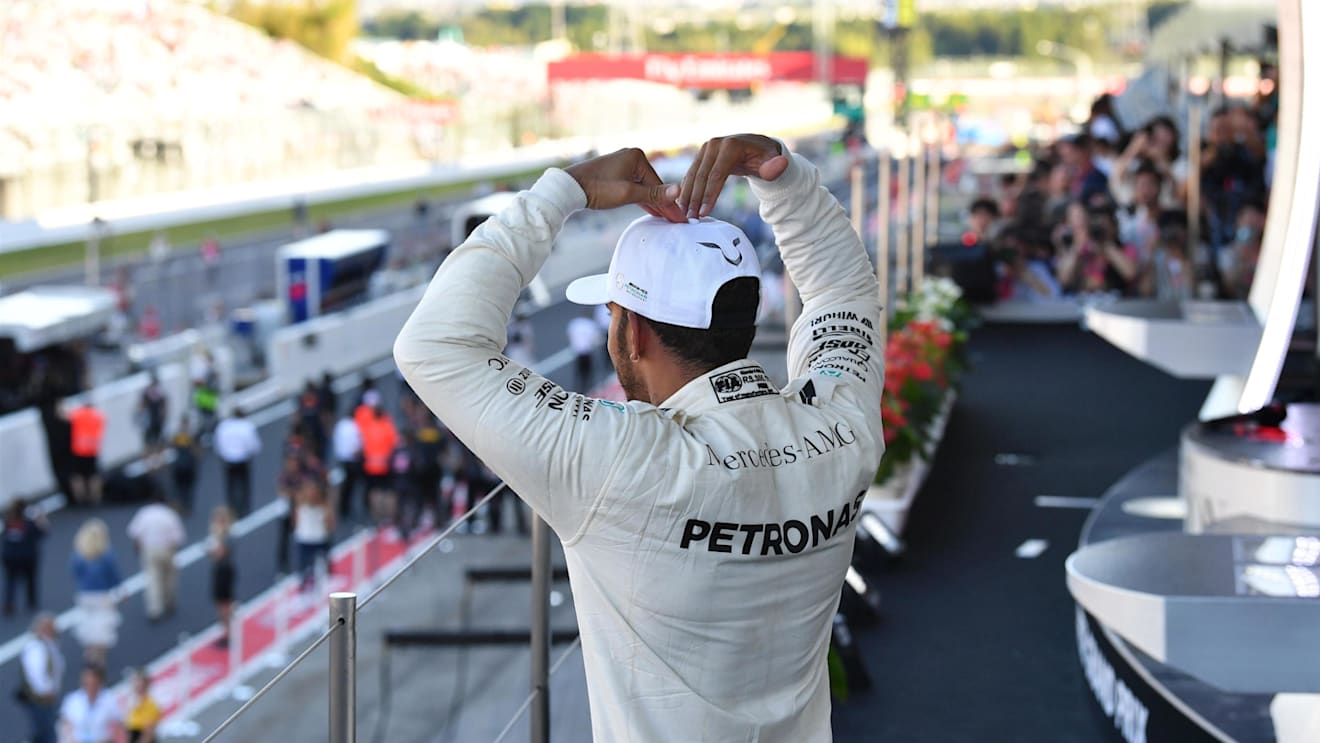 Race winner Lewis Hamilton (GBR) Mercedes AMG F1 celebrates on the podium at Formula One World Championship, Rd16, Japanese Grand Prix, Race, Suzuka, Japan, Sunday 8 October 2017. © Mark Sutton/Sutton Images