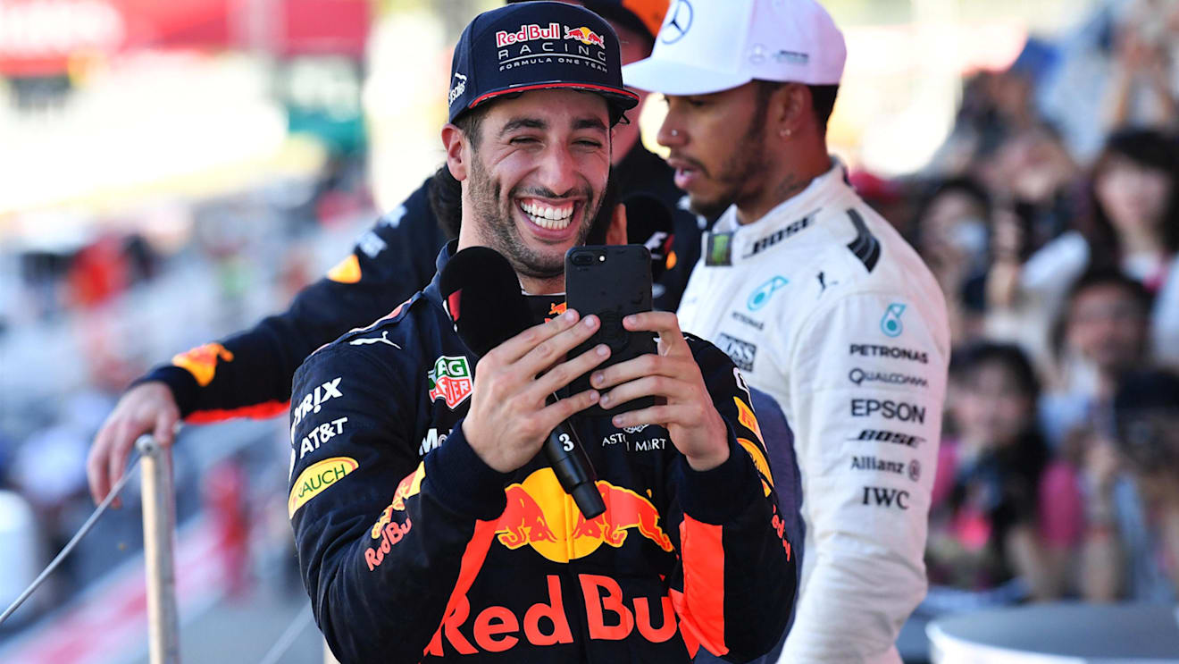 Daniel Ricciardo (AUS) Red Bull Racing celebrates with his phone on the podium at Formula One World Championship, Rd16, Japanese Grand Prix, Race, Suzuka, Japan, Sunday 8 October 2017. © Mark Sutton/Sutton Images