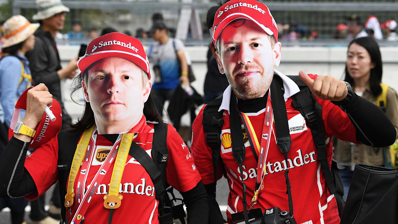 Kimi Raikkonen (FIN) Ferrari and Sebastian Vettel (GER) Ferrari fans and masks at Formula One World Championship, Rd16, Japanese Grand Prix, Preparations, Suzuka, Japan, Thursday 5 October 2017. © Mark Sutton/Sutton Images