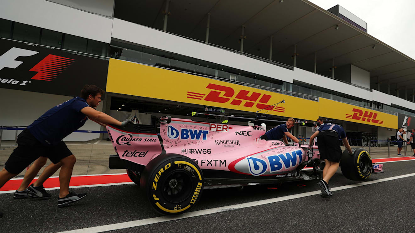 Force India mechanics with Force India VJM10 in pit lane at Formula One World Championship, Rd16, Japanese Grand Prix, Preparations, Suzuka, Japan, Thursday 5 October 2017. © Kym Illman/Sutton Images