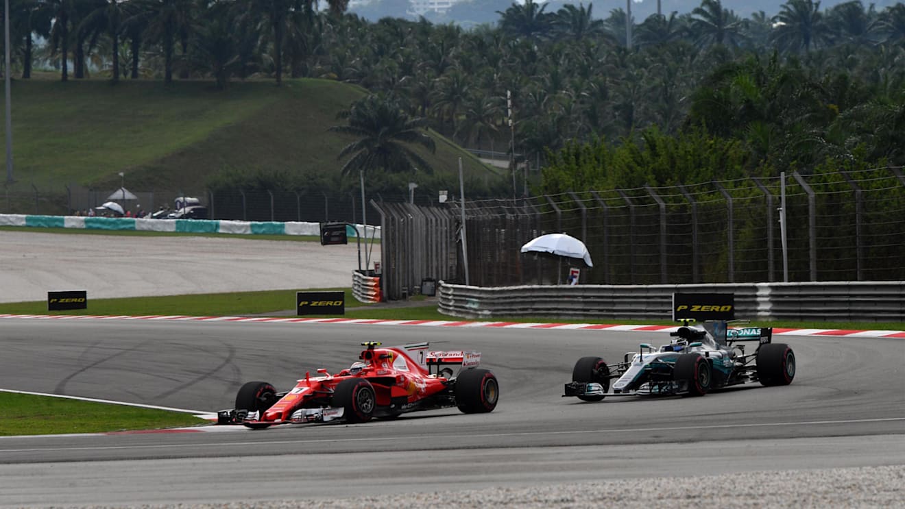 Kimi Raikkonen (FIN) Ferrari SF70-H and Valtteri Bottas (FIN) Mercedes-Benz F1 W08 Hybrid at Formula One World Championship, Rd15, Malaysian Grand Prix, Practice, Sepang, Malaysia, Friday 29 September 2017. © Mark Sutton/Sutton Images