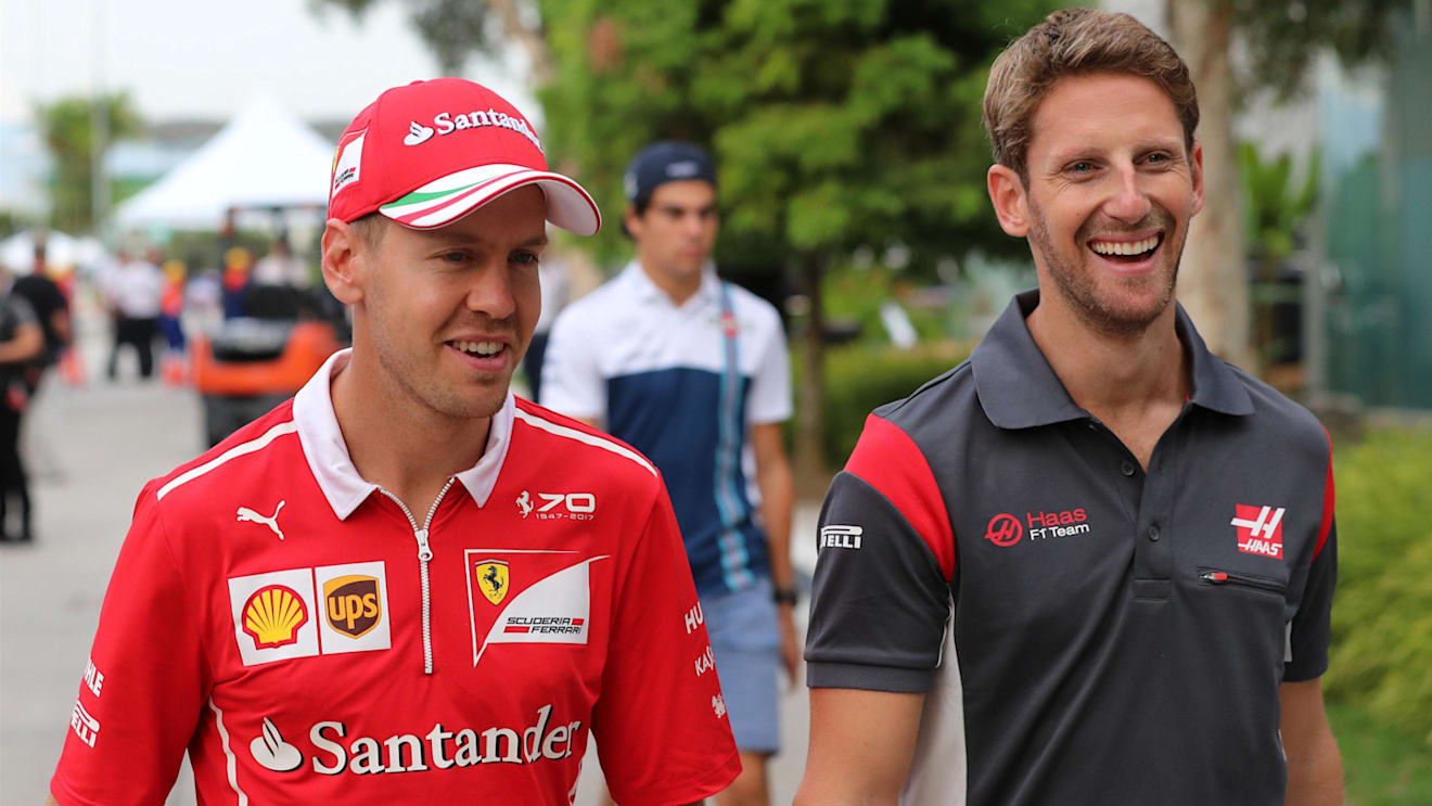 Sebastian Vettel (GER) Ferrari and Romain Grosjean (FRA) Haas F1 at Formula One World Championship, Rd15, Malaysian Grand Prix, Practice, Sepang, Malaysia, Friday 29 September 2017. © Kym Illman/Sutton Images