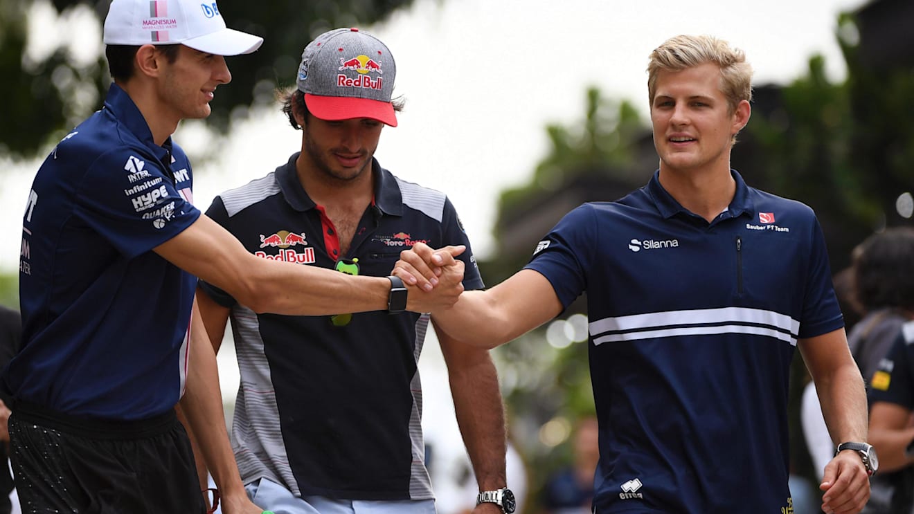 Esteban Ocon (FRA) Force India F1, Carlos Sainz jr (ESP) Scuderia Toro Rosso and Marcus Ericsson (SWE) Sauber at Formula One World Championship, Rd15, Malaysian Grand Prix, Practice, Sepang, Malaysia, Friday 29 September 2017. © Mark Sutton/Sutton Images
