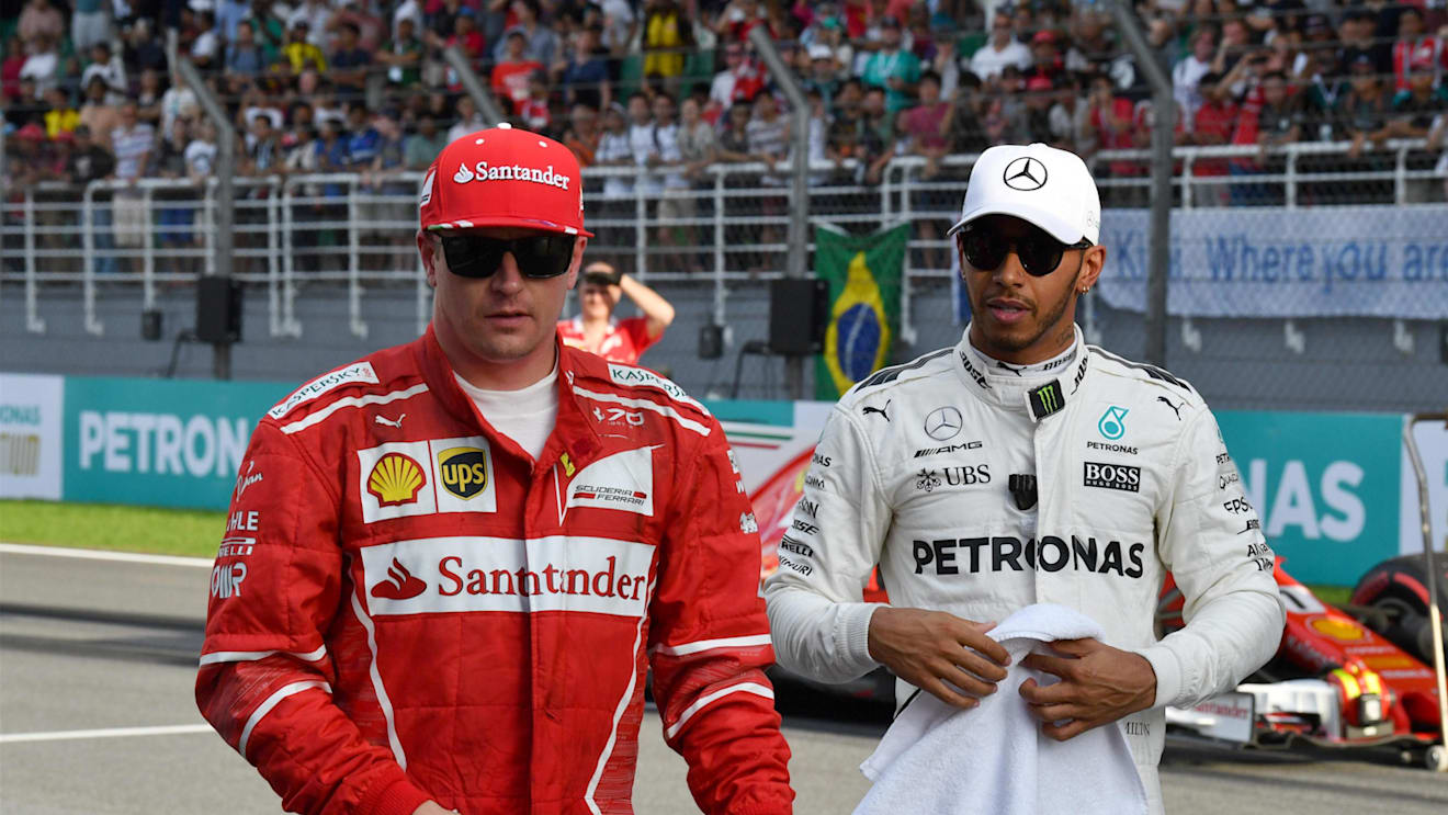 Kimi Raikkonen (FIN) Ferrari and Lewis Hamilton (GBR) Mercedes AMG F1 in parc ferme at Formula One World Championship, Rd15, Malaysian Grand Prix, Qualifying, Sepang, Malaysia, Saturday 30 September 2017. © Mark Sutton/Sutton Images