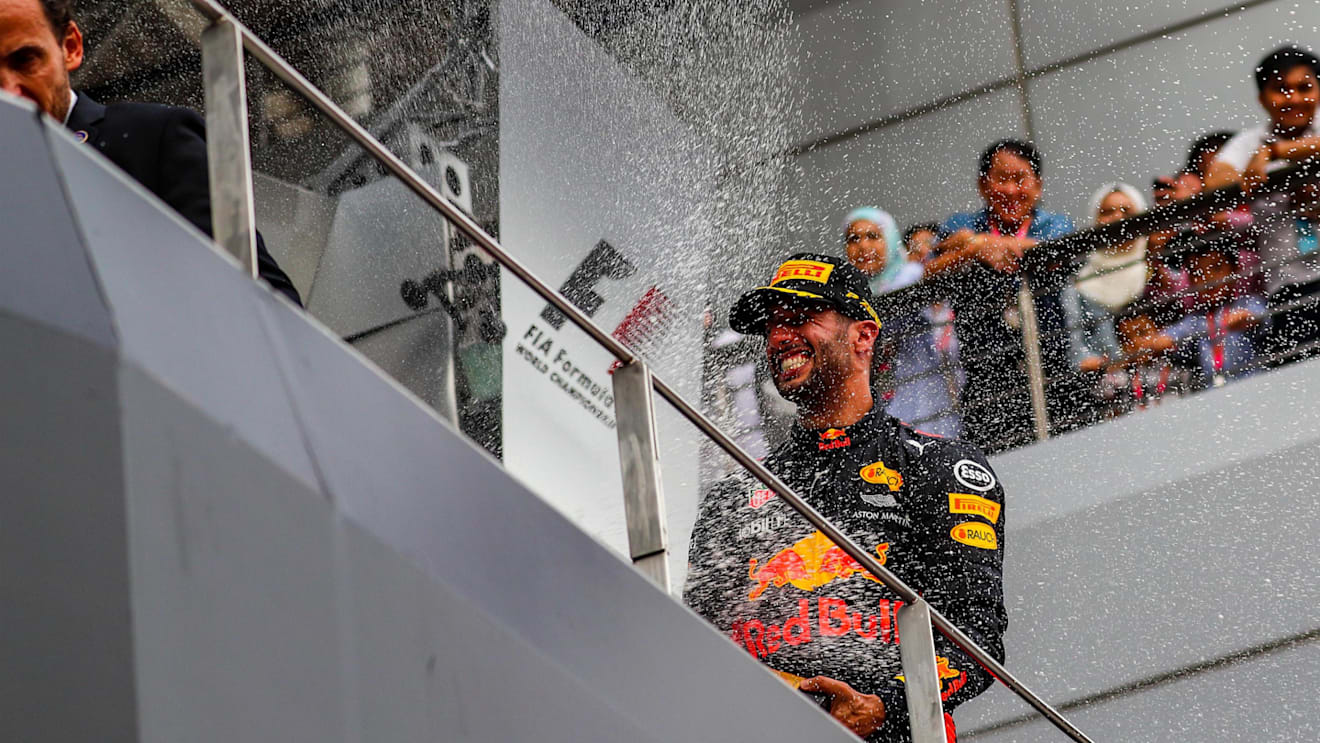 Daniel Ricciardo (AUS) Red Bull Racing celebrates on the podium with the champagne at Formula One World Championship, Rd15, Malaysian Grand Prix, Race, Sepang, Malaysia, Sunday 1 October 2017. © Kym Illman/Sutton Images