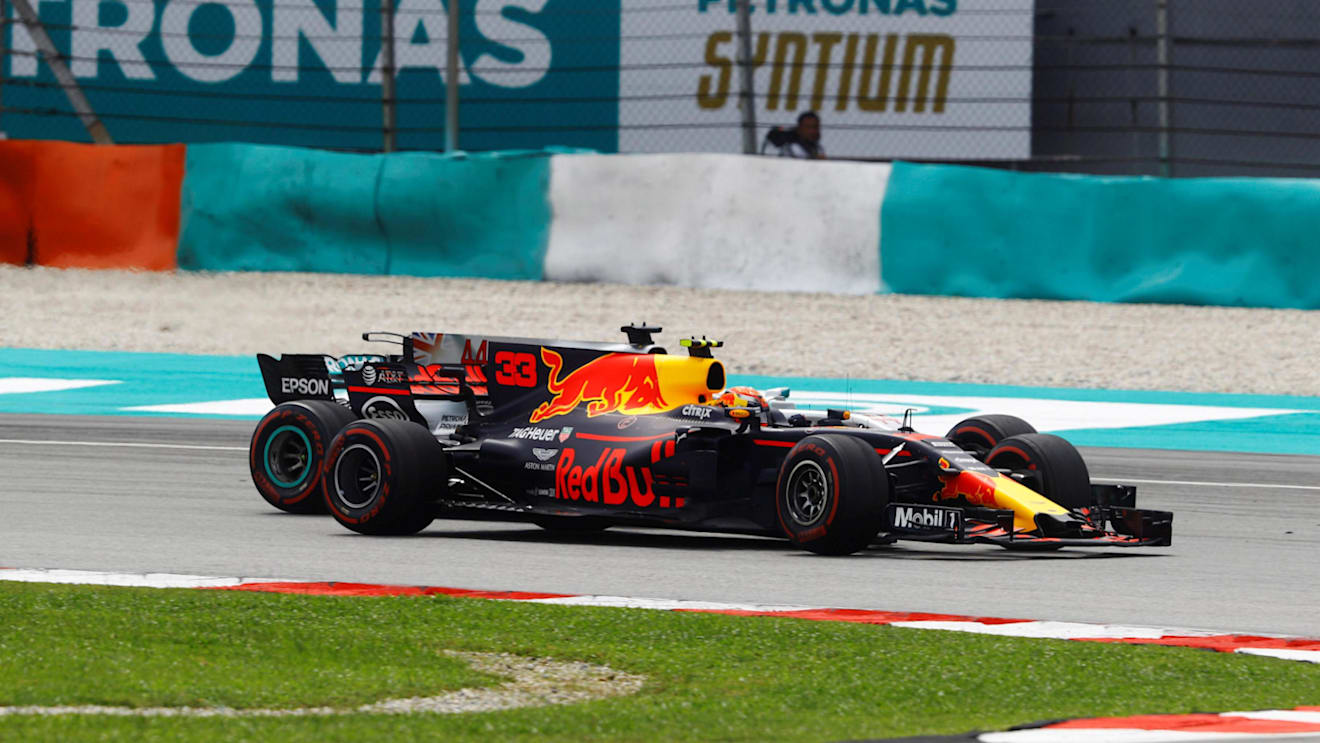 Max Verstappen (NED) Red Bull Racing RB13 overtakes Lewis Hamilton (GBR) Mercedes-Benz F1 W08 Hybrid at Formula One World Championship, Rd15, Malaysian Grand Prix, Race, Sepang, Malaysia, Sunday 1 Octoberr 2017. © Steven Tee/LAT/Sutton Images