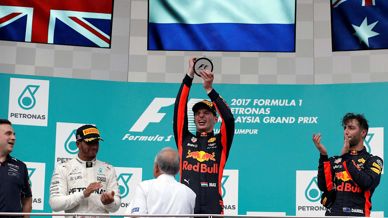 Lewis Hamilton (GBR) Mercedes AMG F1, race winner Max Verstappen (NED) Red Bull Racing and Daniel Ricciardo (AUS) Red Bull Racing celebrate on the podium at Formula One World Championship, Rd15, Malaysian Grand Prix, Race, Sepang, Malaysia, Sunday 1 Octoberr 2017. © Manuel Goria/Sutton Images