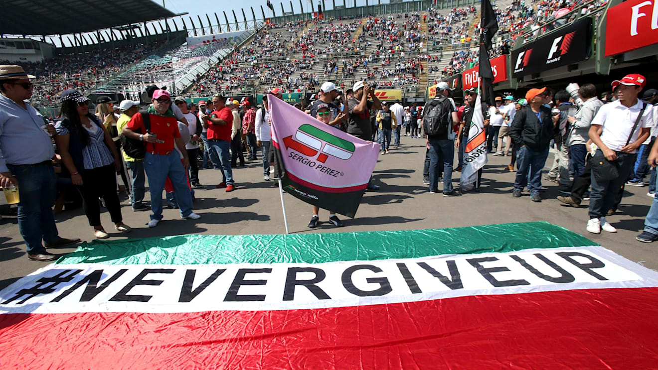 Fans with 'Never Give Up' Mexican banner and flag of Sergio Perez (MEX) Force India and at Formula One World Championship, Rd18, Mexican Grand Prix, Qualifying, Circuit Hermanos Rodriguez, Mexico City, Mexico, Saturday 28 October 2017. © Mirko Stange/Sutton Images