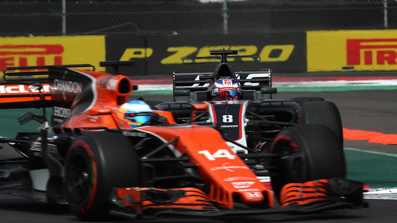 Fernando Alonso (ESP) McLaren MCL32 and Romain Grosjean (FRA) Haas VF-17 battle at Formula One World Championship, Rd18, Mexican Grand Prix, Race, Circuit Hermanos Rodriguez, Mexico City, Mexico, Sunday 29 October 2017. © Kym Illman/Sutton Images