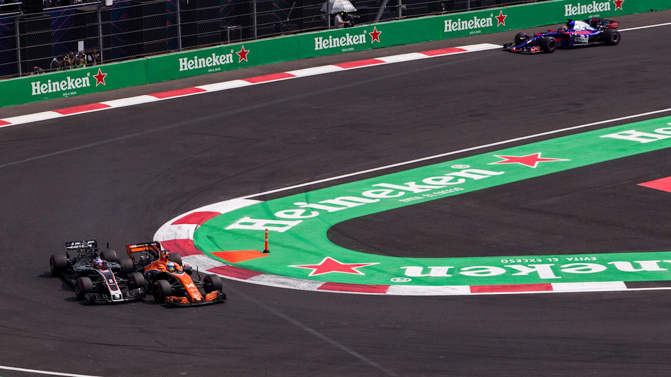 Romain Grosjean (FRA) Haas VF-17 and Fernando Alonso (ESP) McLaren MCL32 battle at Formula One World Championship, Rd18, Mexican Grand Prix, Race, Circuit Hermanos Rodriguez, Mexico City, Mexico, Sunday 29 October 2017. © Manuel Goria/Sutton Images