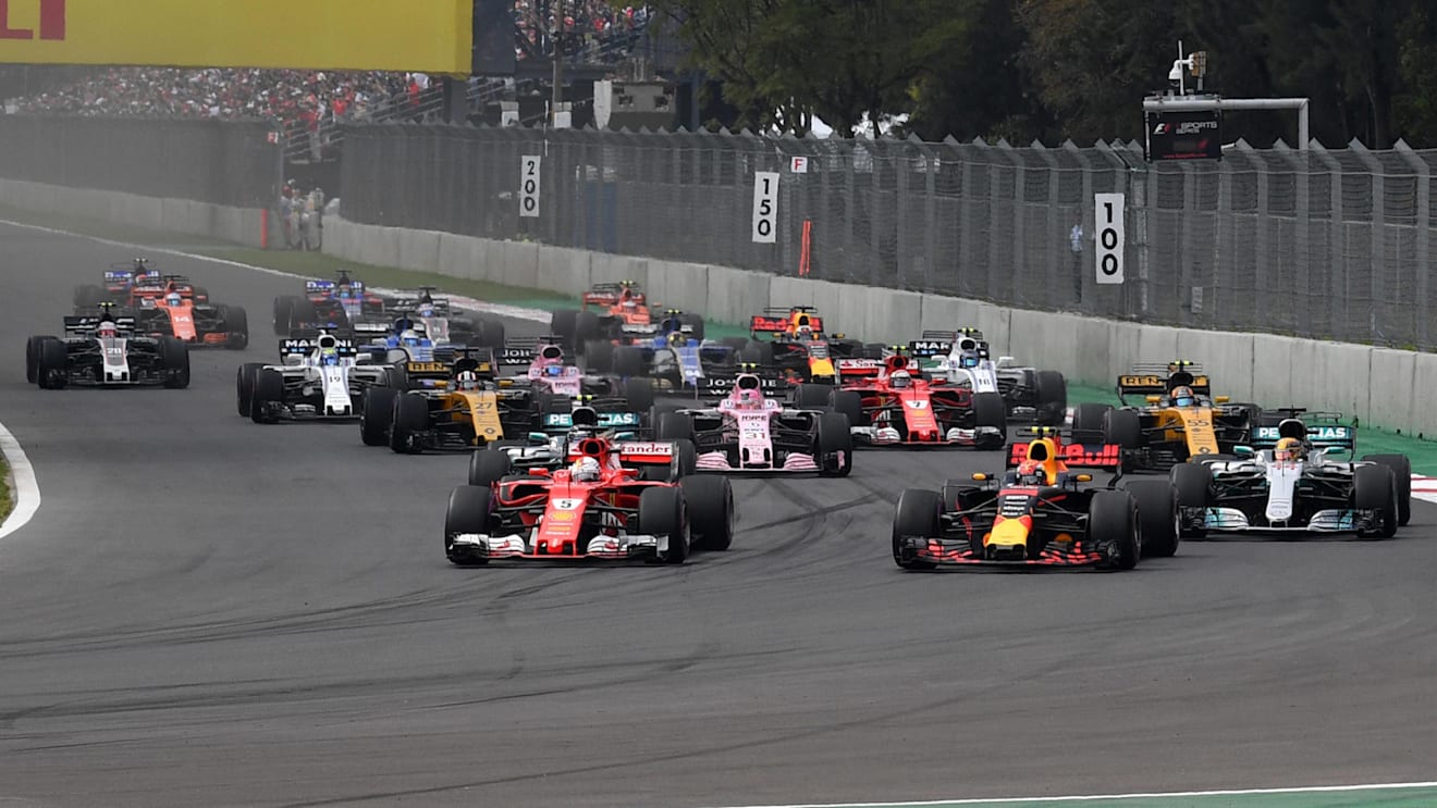 Max Verstappen (NED) Red Bull Racing RB13 and Sebastian Vettel (GER) Ferrari SF70-H battle at the start of the race at Formula One World Championship, Rd18, Mexican Grand Prix, Race, Circuit Hermanos Rodriguez, Mexico City, Mexico, Sunday 29 October 2017.