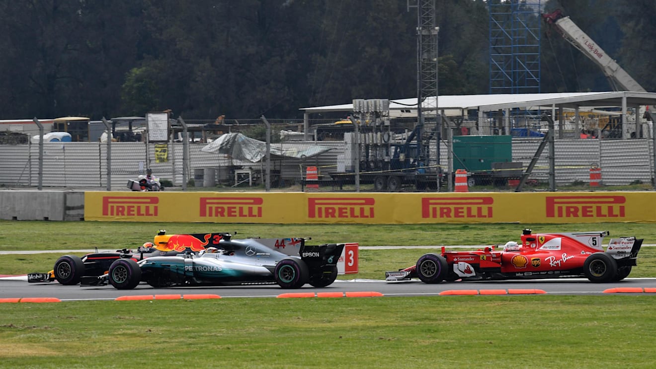 Max Verstappen (NED) Red Bull Racing RB13, Lewis Hamilton (GBR) Mercedes-Benz F1 W08 Hybrid and Sebastian Vettel (GER) Ferrari SF70-H battle at the start of the race at Formula One World Championship, Rd18, Mexican Grand Prix, Race, Circuit Hermanos Rodri