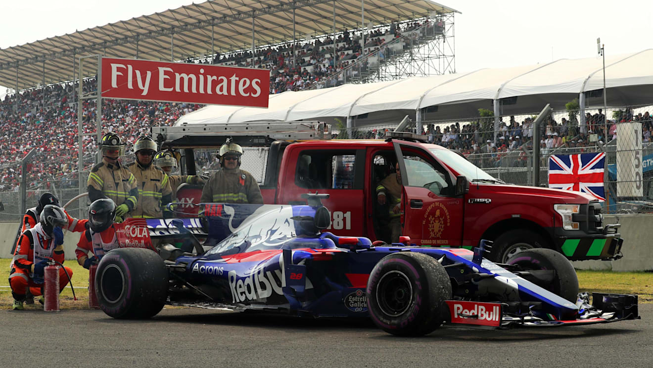 The car of race retiree Brendon Hartley (NZL) Scuderia Toro Rosso STR12 and marshals at Formula One World Championship, Rd18, Mexican Grand Prix, Race, Circuit Hermanos Rodriguez, Mexico City, Mexico, Sunday 29 October 2017. © Kym Illman/Sutton Images