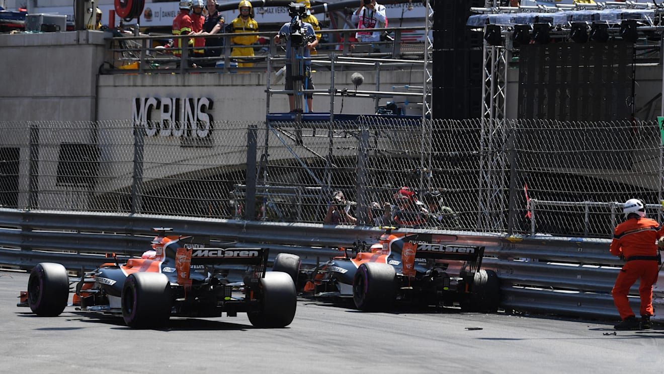 Stoffel Vandoorne (BEL) McLaren MCL32 walks crashed in Q2 and is passed by Jenson Button (GBR) McLaren MCL32 at Formula One World Championship, Rd6, Monaco Grand Prix, Qualifying, Monte-Carlo, Monaco, Saturday 27 May 2017. © Sutton Images