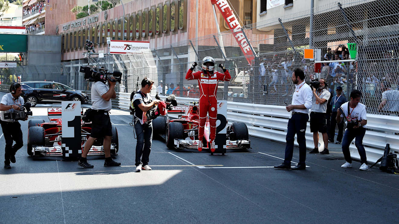 Race winner Sebastian Vettel (GER) Ferrari jumps and celebrates in parc ferme at Formula One World Championship, Rd6, Monaco Grand Prix, Race, Monte-Carlo, Monaco, Sunday 28 May 2017. © Sutton Images