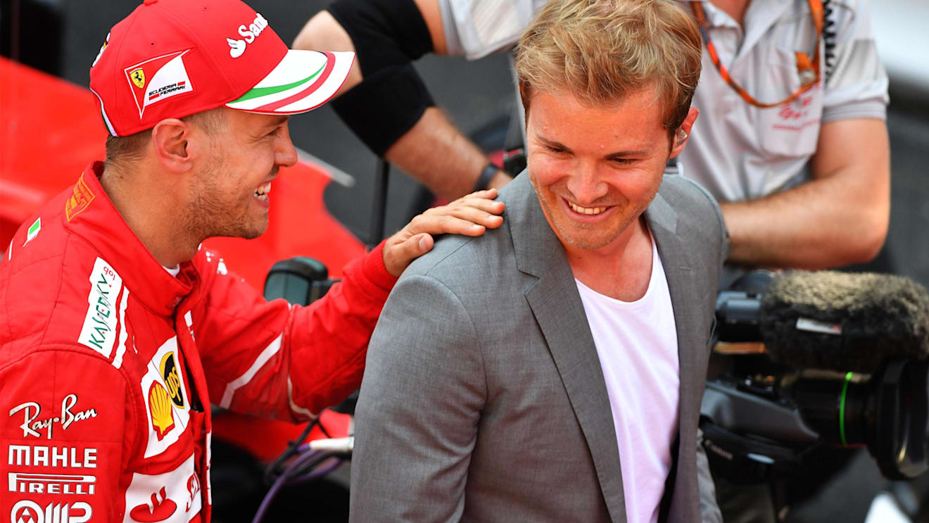 Sebastian Vettel (GER) Ferrari and Nico Rosberg (GER) Mercedes-Benz Ambassador at Formula One World Championship, Rd6, Monaco Grand Prix, Race, Monte-Carlo, Monaco, Sunday 28 May 2017. © Sutton Images