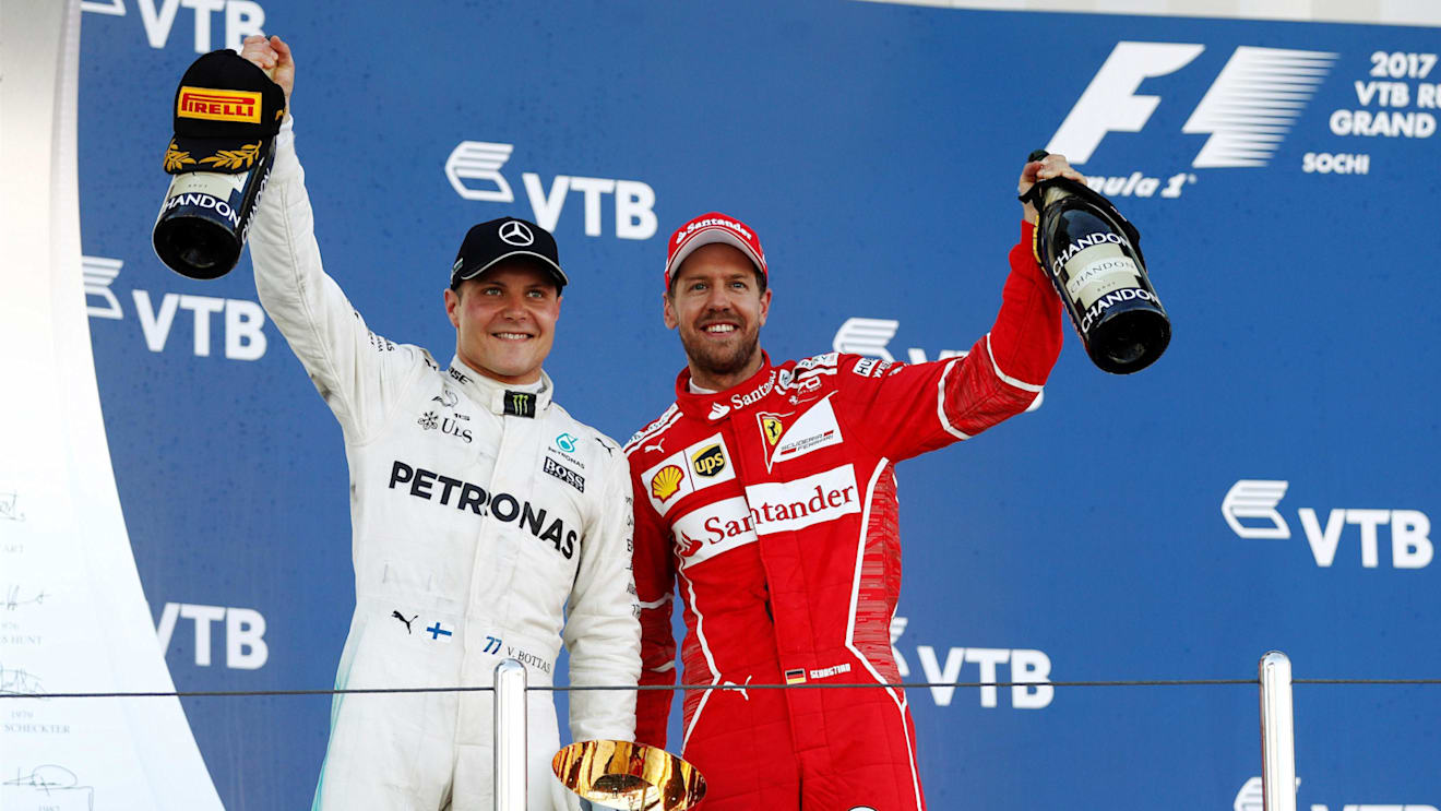 Race winner Valtteri Bottas (FIN) Mercedes AMG F1 and Sebastian Vettel (GER) Ferrari celebrate on the podium with the trophies at Formula One World Championship, Rd4, Russian Grand Prix, Race, Sochi Autodrom, Sochi, Krasnodar Krai, Russia, Sunday 30 April 2017. © Sutton Motorsport Images