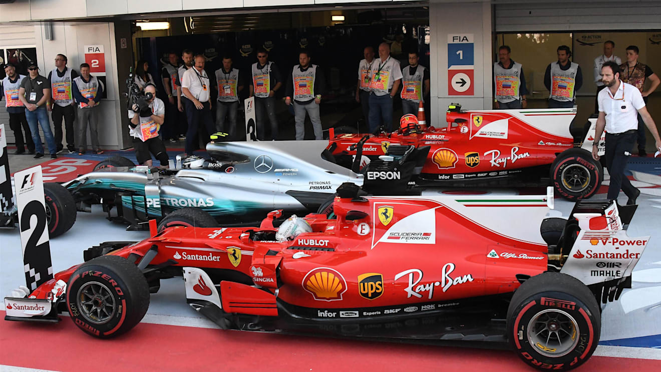 Vettel Ferrari SF70-H, Bottas Mercedes-Benz and Raikkonen Ferrari SF70-H in parc ferme at F1 World Championship, Rd4, Russian Grand Prix, Race, Sochi Autodrom, Sochi, Krasnodar Krai, Russia, Sunday 30 April 2017. © Sutton Motorsport Images