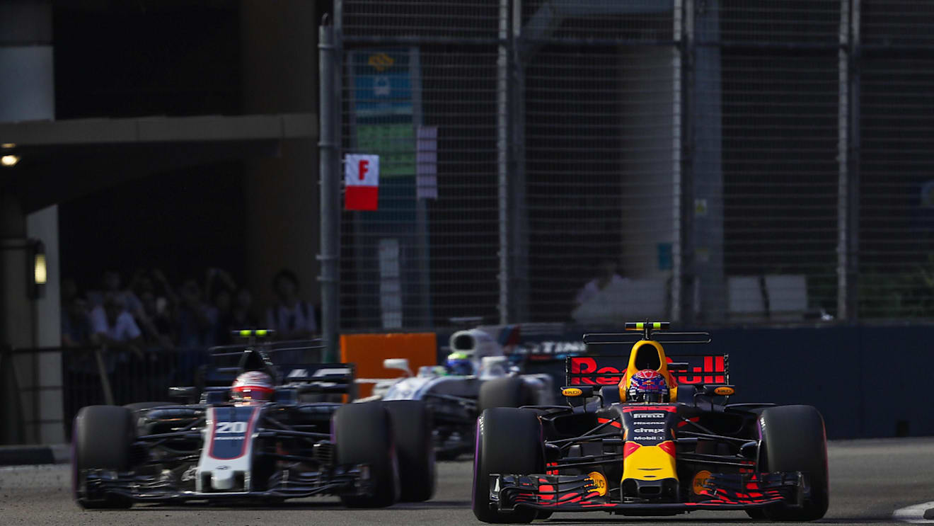 Max Verstappen (NED) Red Bull Racing RB13 and Kevin Magnussen (DEN) Haas VF-17 at Formula One World Championship, Rd14, Singapore Grand Prix, Qualifying, Marina Bay Street Circuit, Singapore, Saturday 16 September 2017. © Sutton Images