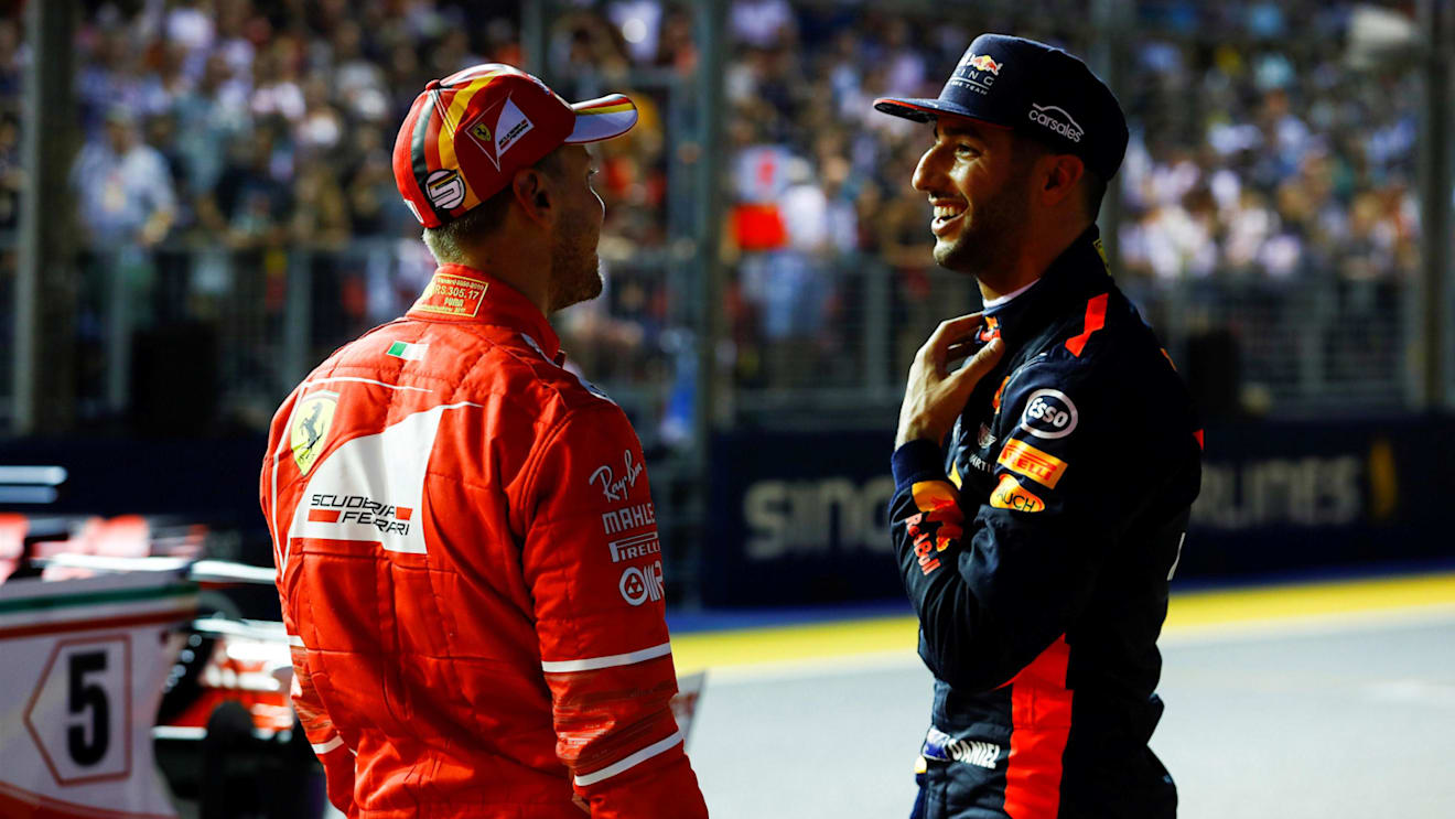 Pole sitter Sebastian Vettel (GER) Ferrari and Daniel Ricciardo (AUS) Red Bull Racing in parc ferme at Formula One World Championship, Rd14, Singapore Grand Prix, Qualifying, Marina Bay Street Circuit, Singapore, Saturday 16 September 2017. © Sutton Images