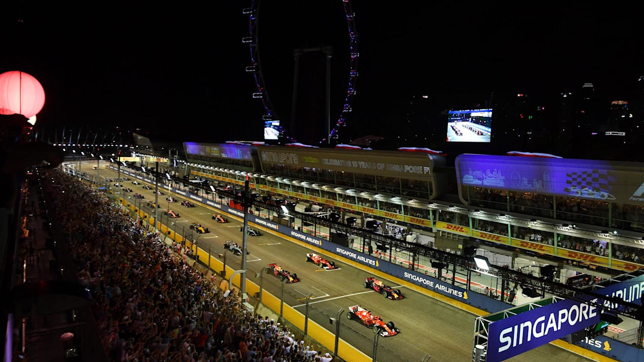 Sebastian Vettel (GER) Ferrari SF70-H leads at the start of the race at Formula One World Championship, Rd14, Singapore Grand Prix, Race, Marina Bay Street Circuit, Singapore, Sunday 17 September 2017. © Kym Illman/Sutton Images