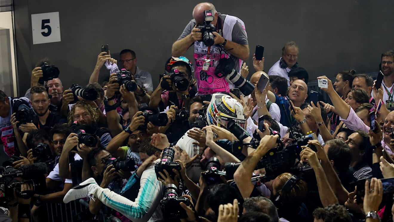Race winner Lewis Hamilton (GBR) Mercedes AMG F1 celebrates in parc ferme at Formula One World Championship, Rd14, Singapore Grand Prix, Race, Marina Bay Street Circuit, Singapore, Sunday 17 September 2017. © Mirko Stange/Sutton Images