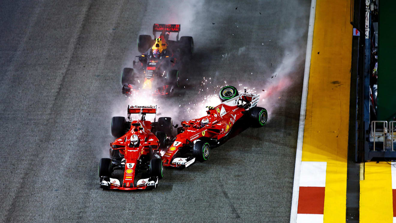Sebastian Vettel (GER) Ferrari SF70-H, Max Verstappen (NED) Red Bull Racing RB13 and Kimi Raikkonen (FIN) Ferrari SF70-H crash at the start of the race at Formula One World Championship, Rd14, Singapore Grand Prix, Race, Marina Bay Street Circuit, Singapore, Sunday 17 September 2017. © Kym Illman/Sutton Images