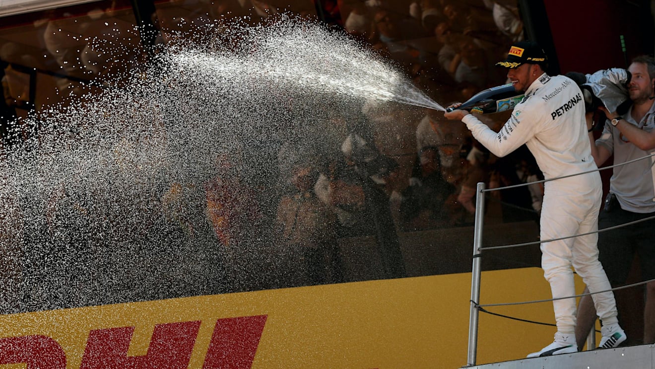Race winner Lewis Hamilton (GBR) Mercedes AMG F1 celebrates on the podium with the champagne at Formula One World Championship, Rd5, Spanish Grand Prix, Race, Barcelona, Spain, Sunday 14 May 2017. © Sutton Motorsport Images