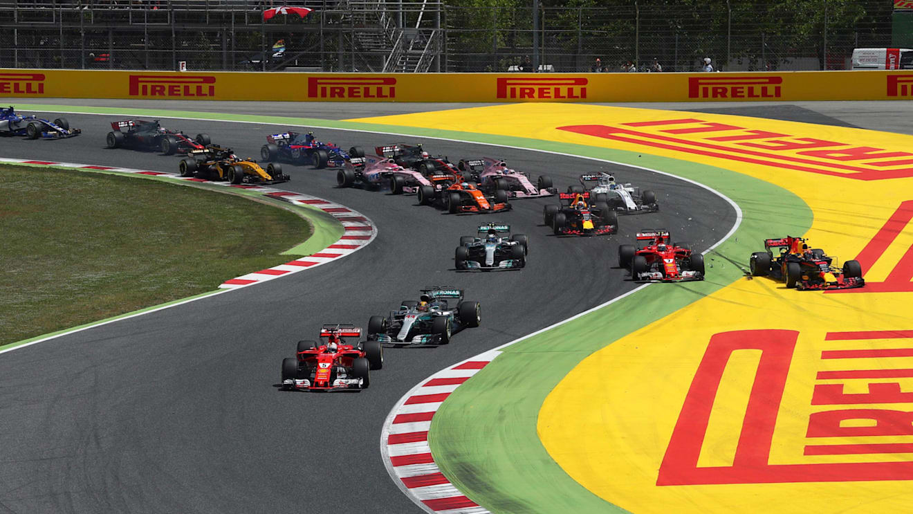 Kimi Raikkonen (FIN) Ferrari SF70-H and Max Verstappen (NED) Red Bull Racing RB13 collide and crash as Sebastian Vettel (GER) Ferrari SF70-H leads at the start of the race at Formula One World Championship, Rd5, Spanish Grand Prix, Race, Barcelona, Spain, Sunday 14 May 2017. © Sutton Motorsport Images
