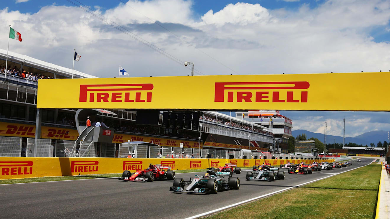 Sebastian Vettel (GER) Ferrari SF70-H and Lewis Hamilton (GBR) Mercedes-Benz F1 W08 Hybrid lead at the start of the race at Formula One World Championship, Rd5, Spanish Grand Prix, Race, Barcelona, Spain, Sunday 14 May 2017. © Sutton Motorsport Images