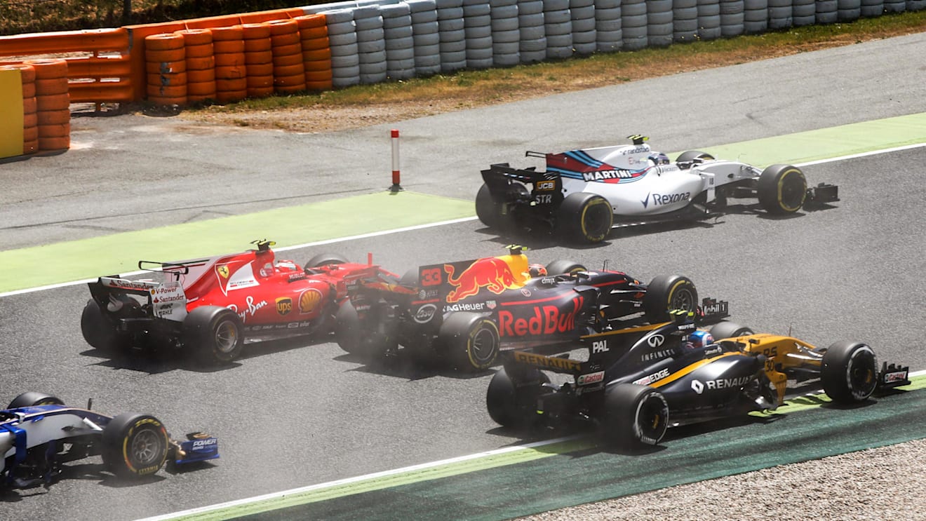 Kimi Raikkonen (FIN) Ferrari SF70-H AND Max Verstappen (NED) Red Bull Racing RB13 collide at the start of the race at Formula One World Championship, Rd5, Spanish Grand Prix, Race, Barcelona, Spain, Sunday 14 May 2017. © Sutton Motorsport Images