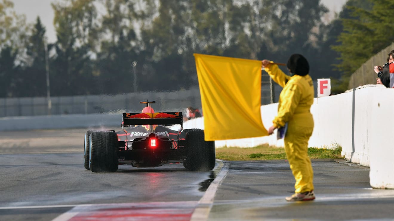 Marshal with yellow flag for Max Verstappen (NED) Red Bull Racing RB13 at the end of pit lane at Formula One Testing, Day Four, Barcelona, Spain, 2 March 2017. © Sutton Images