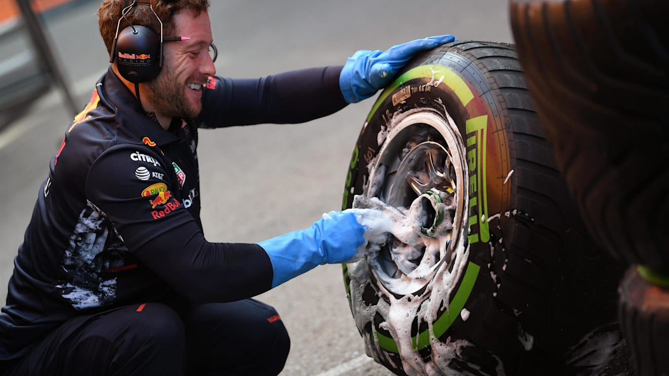 Red Bull Racing mechanic washes Pirelli tyres and wheels at Formula One Testing, Day Four, Barcelona, Spain, 2 March 2017. © Sutton Images