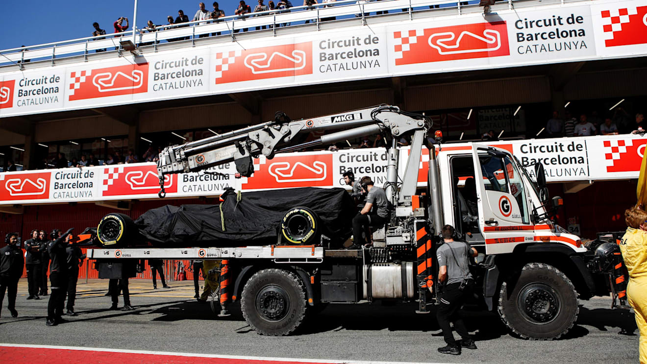 The car of Fernando Alonso (ESP) McLaren MCL32 is returned to the pits at Formula One Testing, Day Four, Barcelona, Spain, 10 March 2017. © Sutton Images