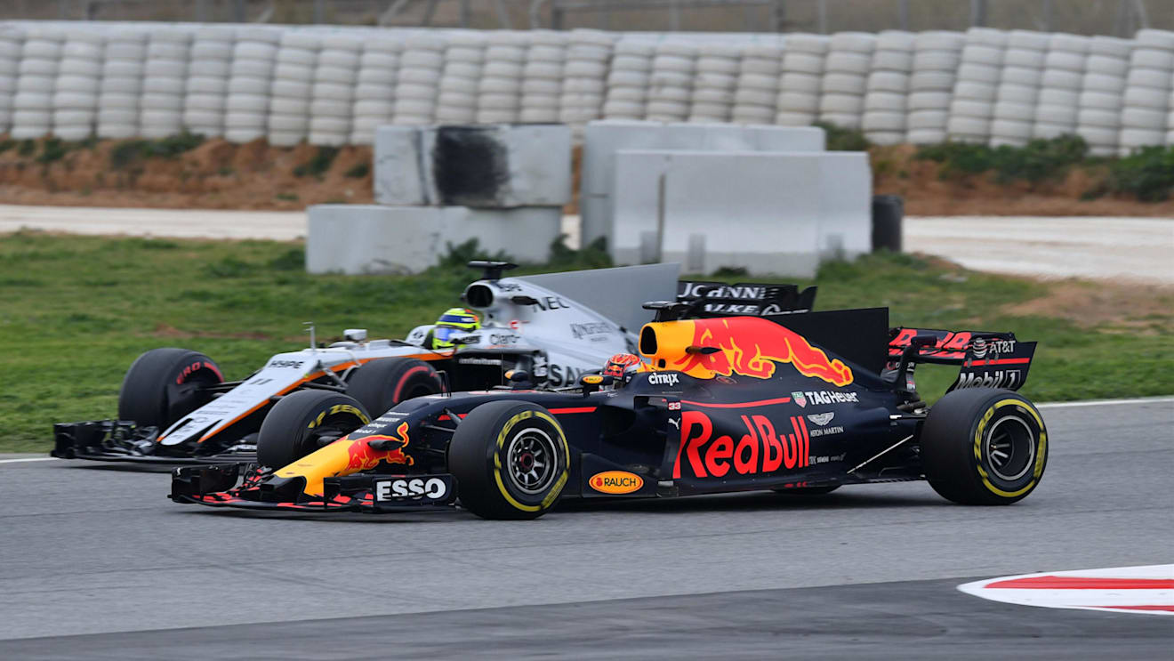 Max Verstappen (NED) Red Bull Racing RB13 and Sergio Perez (MEX) Force India VJM10 at Formula One Testing, Day Two, Barcelona, Spain, 8 March 2017. © Sutton Images