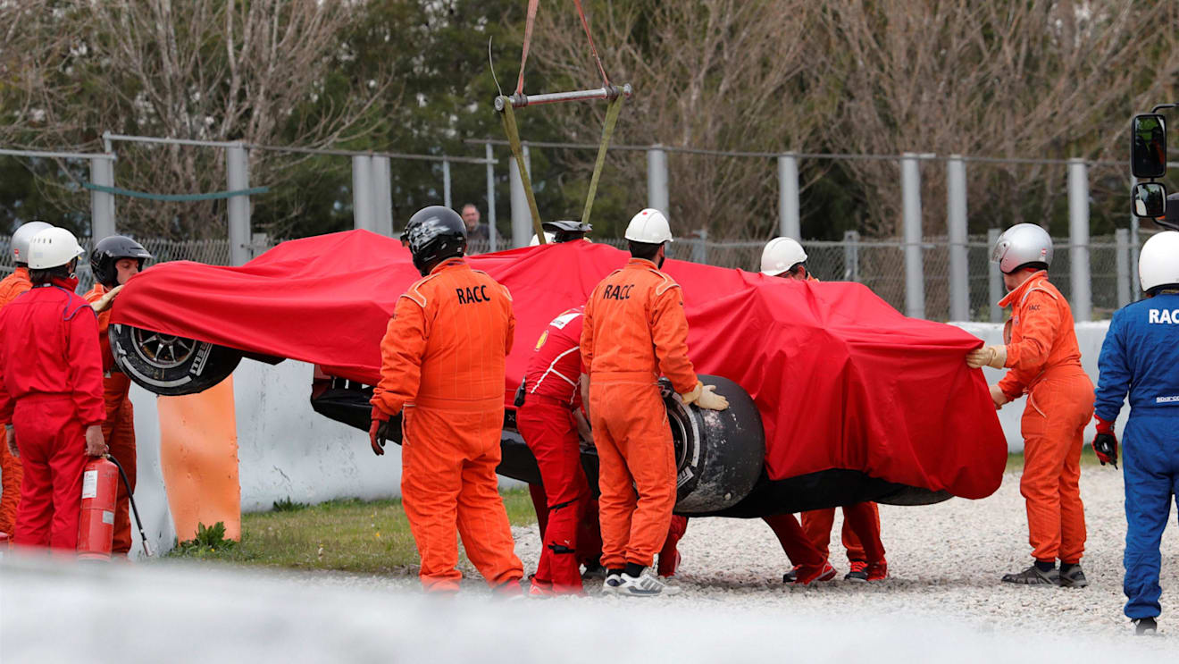 The car of Kimi Raikkonen (FIN) Ferrari SF70-H is recovered from the gravel at Formula One Testing, Day Two, Barcelona, Spain, 8 March 2017. © Sutton Images