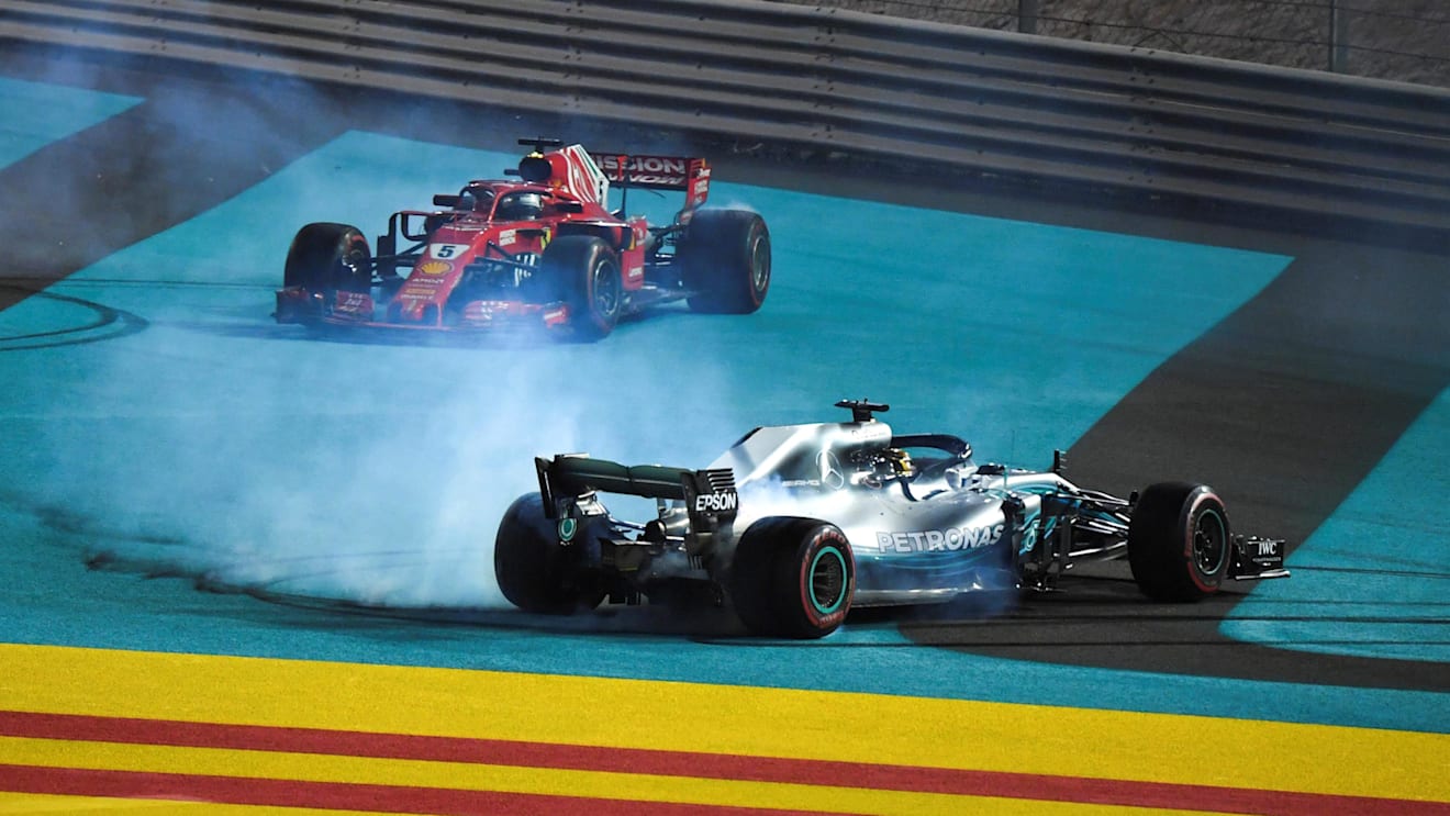 Lewis Hamilton, Mercedes-AMG F1 W09 EQ Power+ and Sebastian Vettel, Ferrari SF71H celebrate with donuts at the end of the race at Formula One World Championship, Rd21, Abu Dhabi Grand Prix, Race, Yas Marina Circuit, Abu Dhabi, UAE, Sunday 25 November 2018.