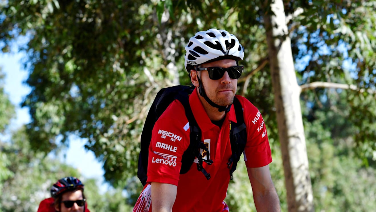 Sebastian Vettel (GER) Ferrari on a bike at Formula One World Championship, Rd1, Australian Grand Prix, Practice, Melbourne, Australia, Friday 23 March 2018. © Jerry Andre/Sutton Images