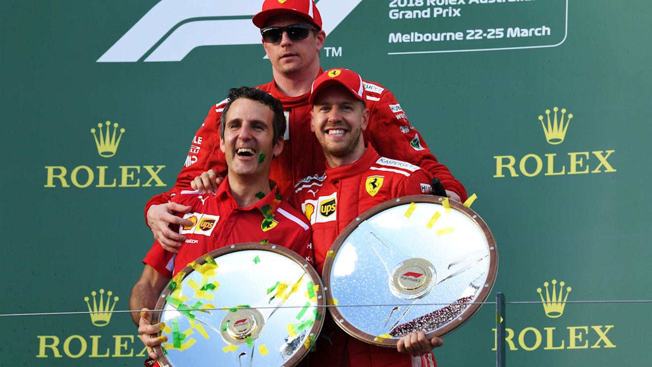 Race winner Sebastian Vettel (GER) Ferrari celebrates on the podium with Kimi Raikkonen (FIN) Ferrari and the trophies at Formula One World Championship, Rd1, Australian Grand Prix, Race, Melbourne, Australia, Sunday 25 March 2018. © Mark Sutton/Sutton Images