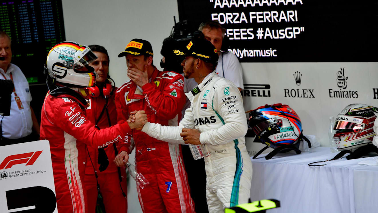 Sebastian Vettel (GER) Ferrari and Lewis Hamilton (GBR) Mercedes-AMG F1 celebrate in parc ferme at Formula One World Championship, Rd1, Australian Grand Prix, Race, Melbourne, Australia, Sunday 25 March 2018. © Jerry Andre/Sutton Images