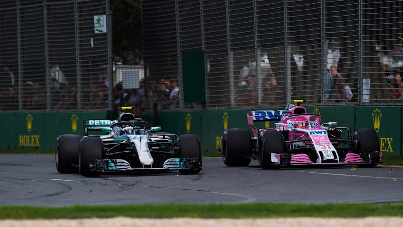 Valtteri Bottas (FIN) Mercedes-AMG F1 W09 EQ Power+ and Esteban Ocon (FRA) Force India VJM11 battle at Formula One World Championship, Rd1, Australian Grand Prix, Race, Melbourne, Australia, Sunday 25 March 2018. © Daniel Kalisz/Sutton Images