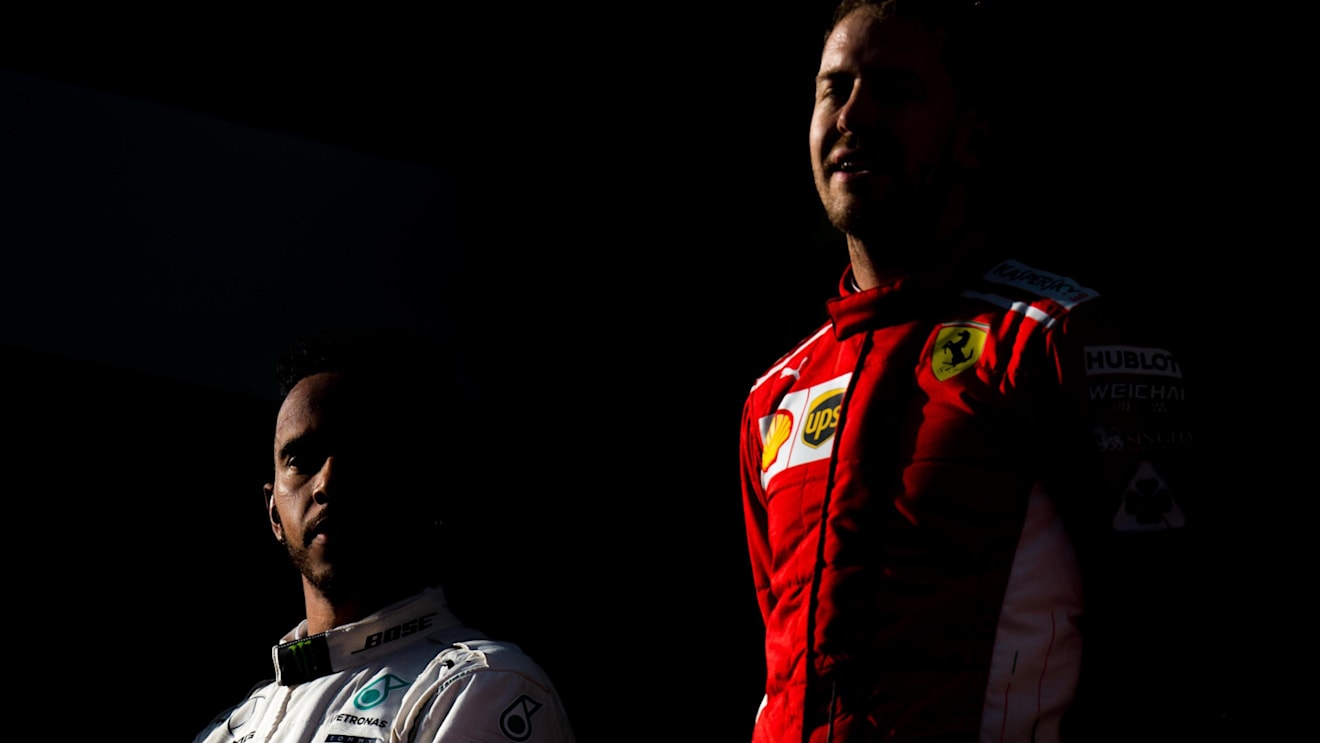 Lewis Hamilton (GBR) Mercedes-AMG F1 and Sebastian Vettel (GER) Ferrari on the podium at Formula One World Championship, Rd1, Australian Grand Prix, Race, Melbourne, Australia, Sunday 25 March 2018. © Daniel Kalisz/Sutton Images